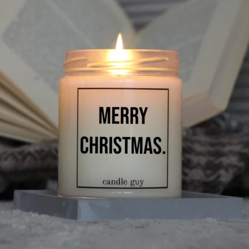 candle guy Duftkerze mit dem Spruch "Merry Christmas." in Aktion – brennt über 70 Stunden