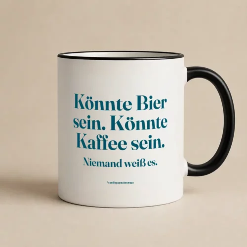 White mug with black handle displaying teal German quote: 'Könnte Bier sein. Könnte Kaffee sein. Niemand weiß es.'